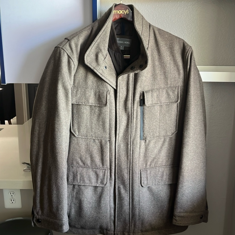 Michael Kors utility jacket. Six front pockets, one inside pocket with bib.